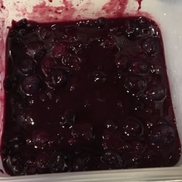 blueberry syrup in container